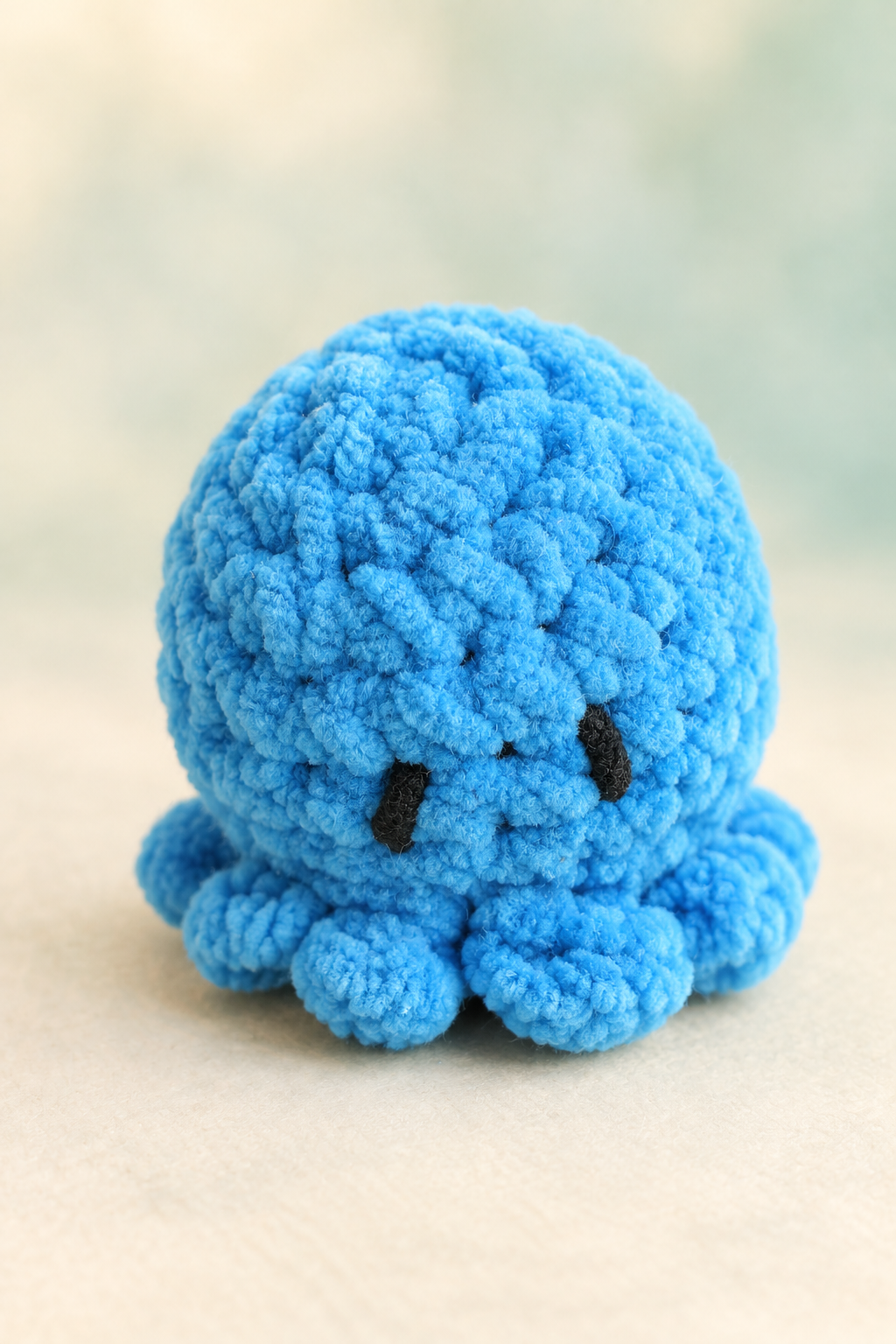 Blue crocheted octopus plush, alternate portrait product image