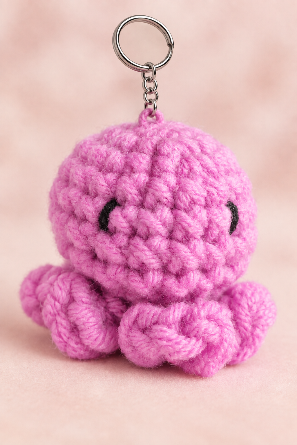 Pink crocheted octopus with silver key ring